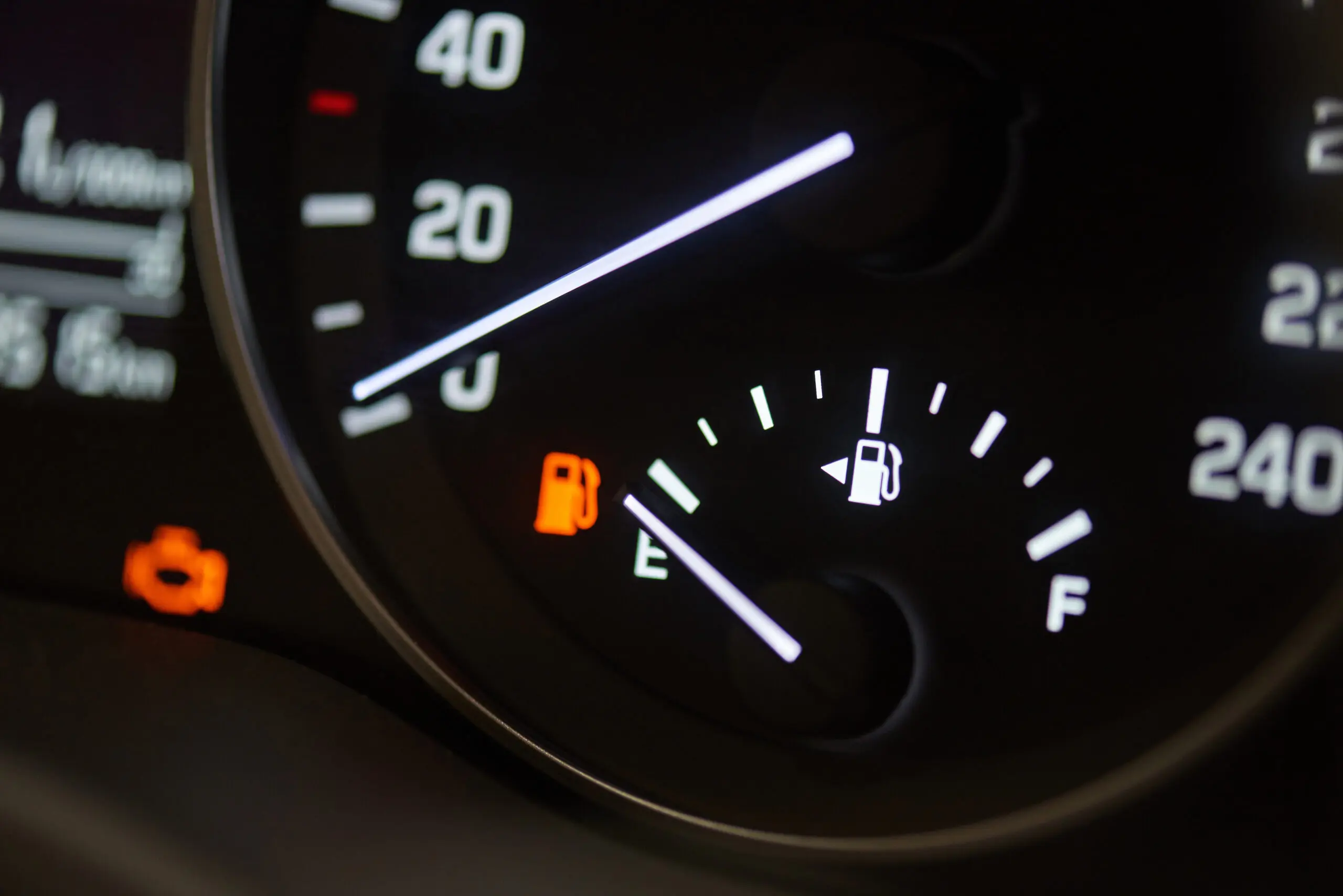 Fuel gage in car reading "empty."