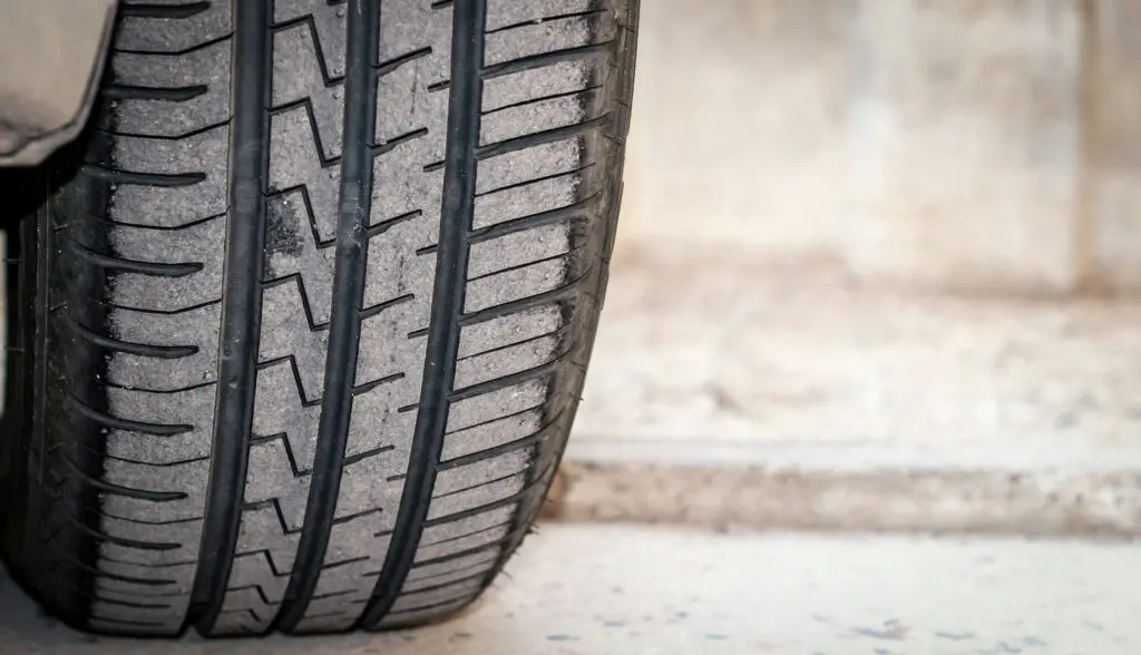 Close-up of worn tire. 