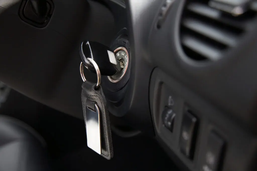 Close-up of key in ignition. 