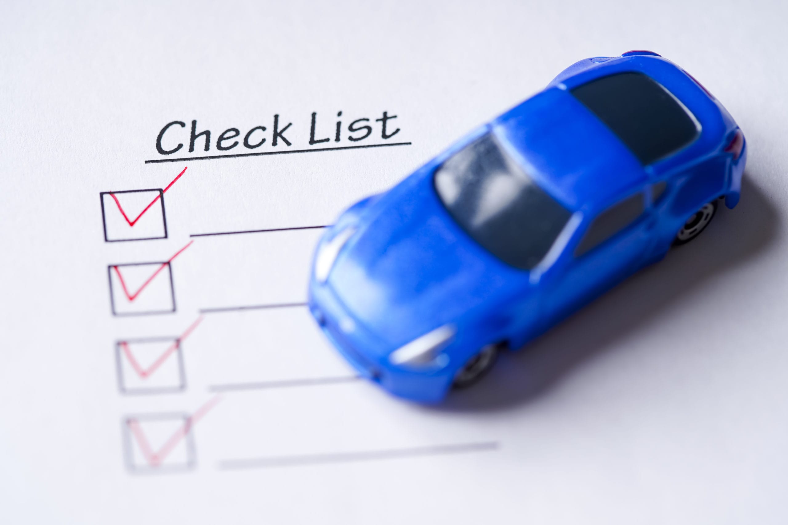 toy car on a road trip inspection checklist