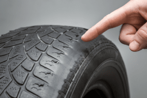 what happens when you don't rotate your tires - uneven tread wear