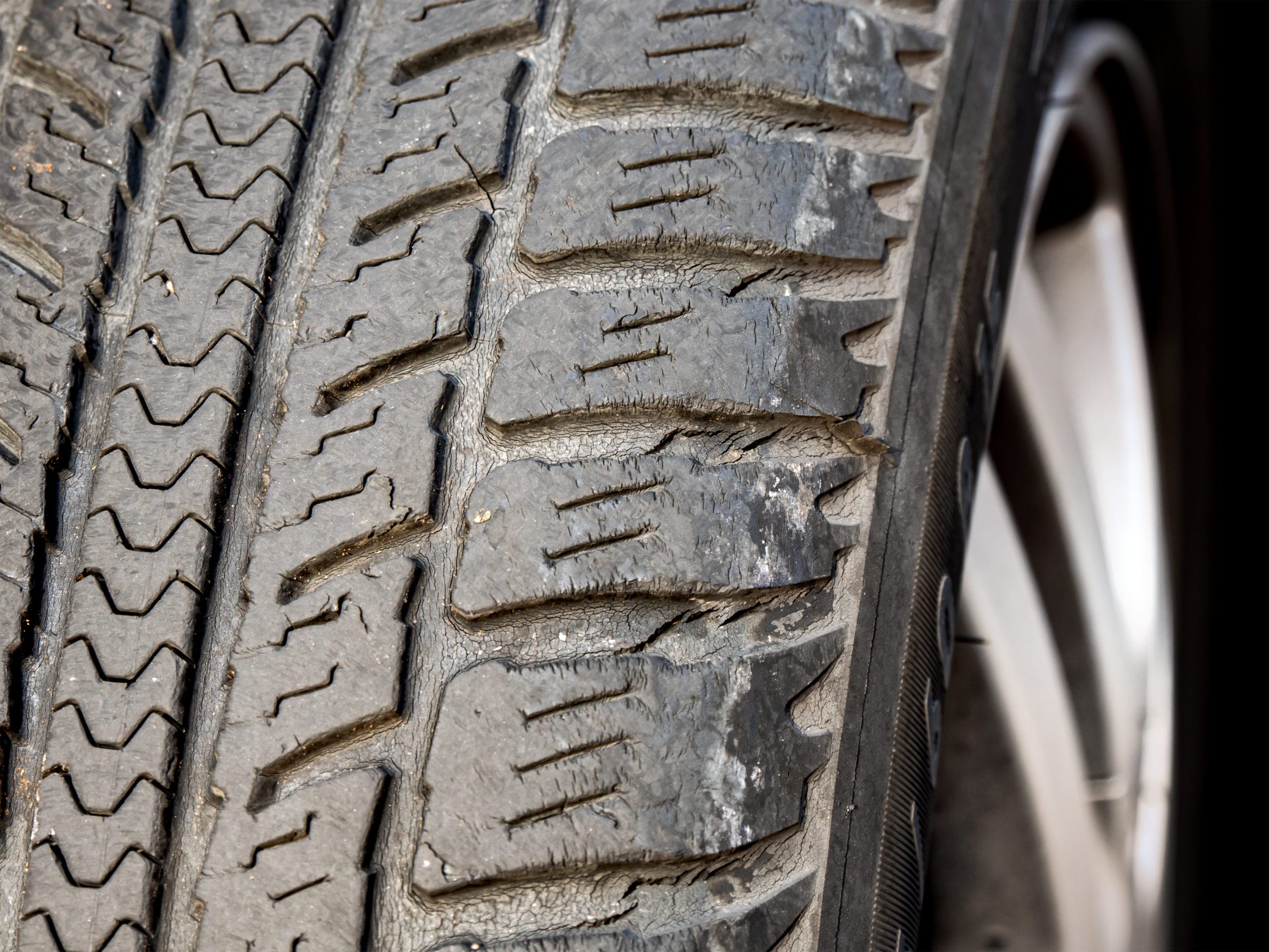 Old, Worn and Cracked tire tread, Poor Drivability and High Risk of Traffic Accident