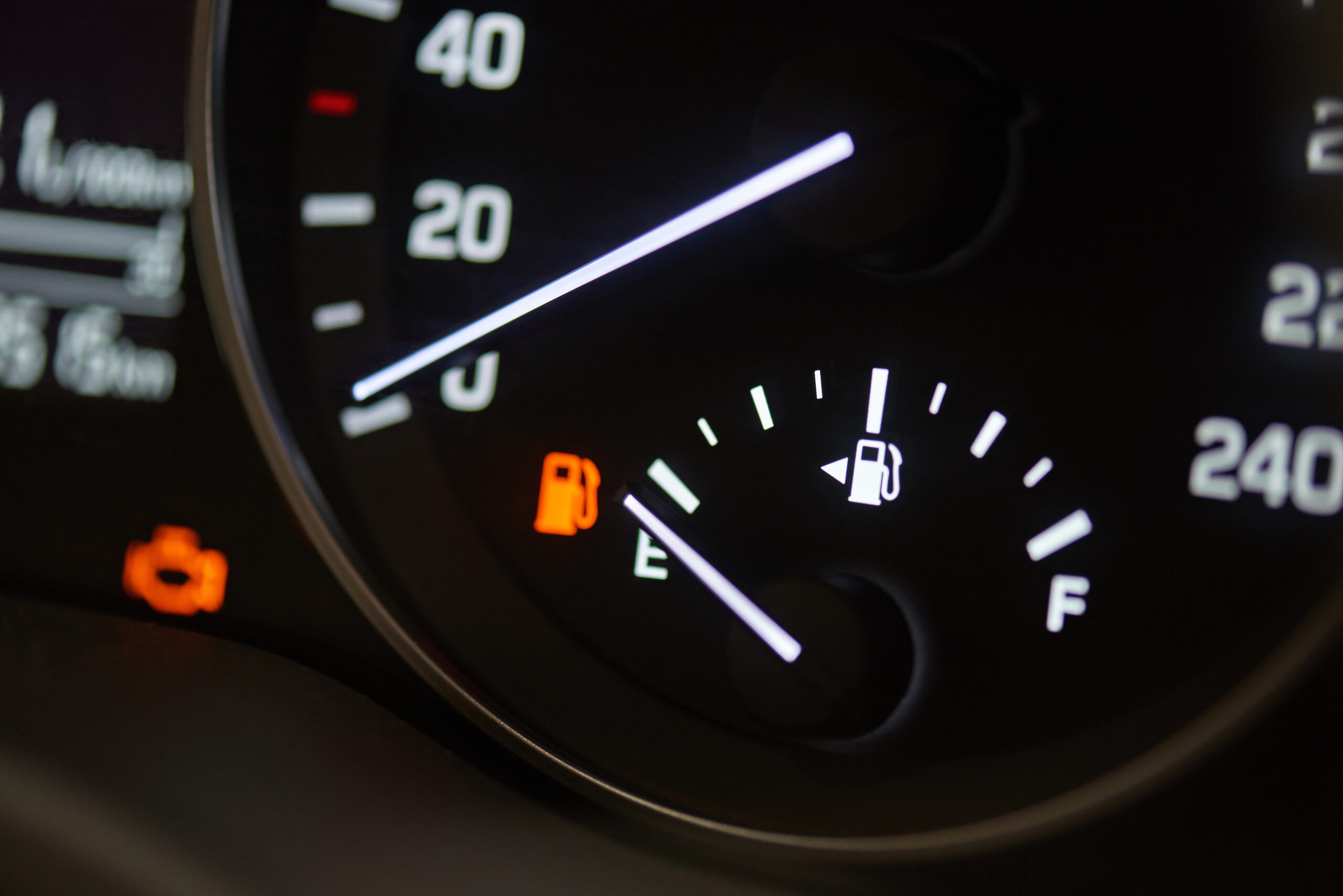 Fuel gage in car reading "empty."