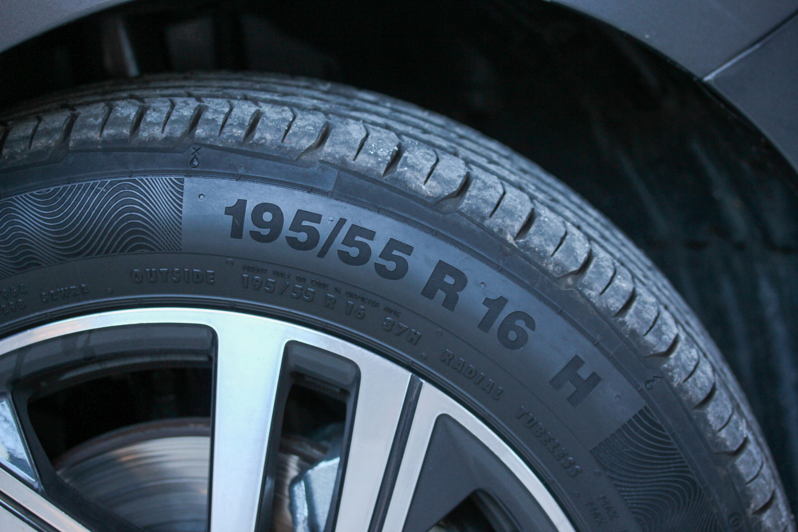 Close-up of load index markings on tire.
