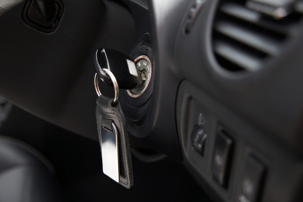 Close-up of key in ignition. 