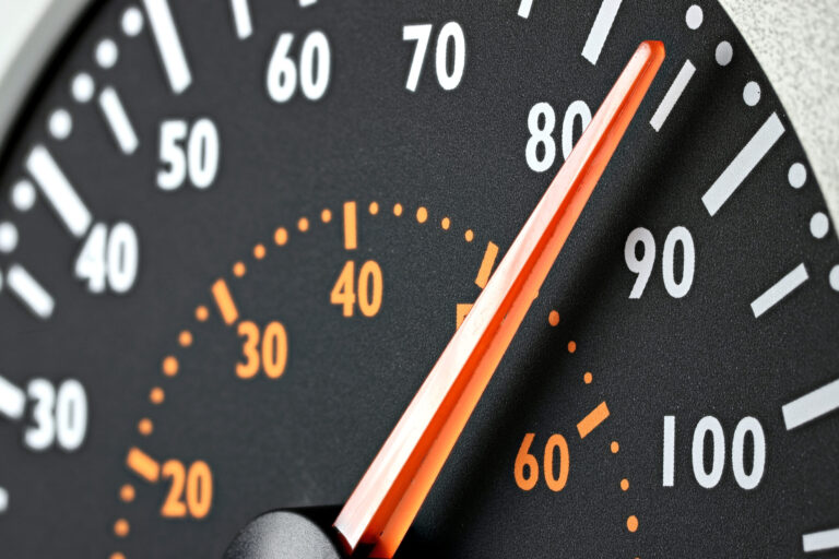 Close-up of car speedometer.