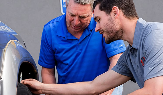 Team reviewing vehicle details