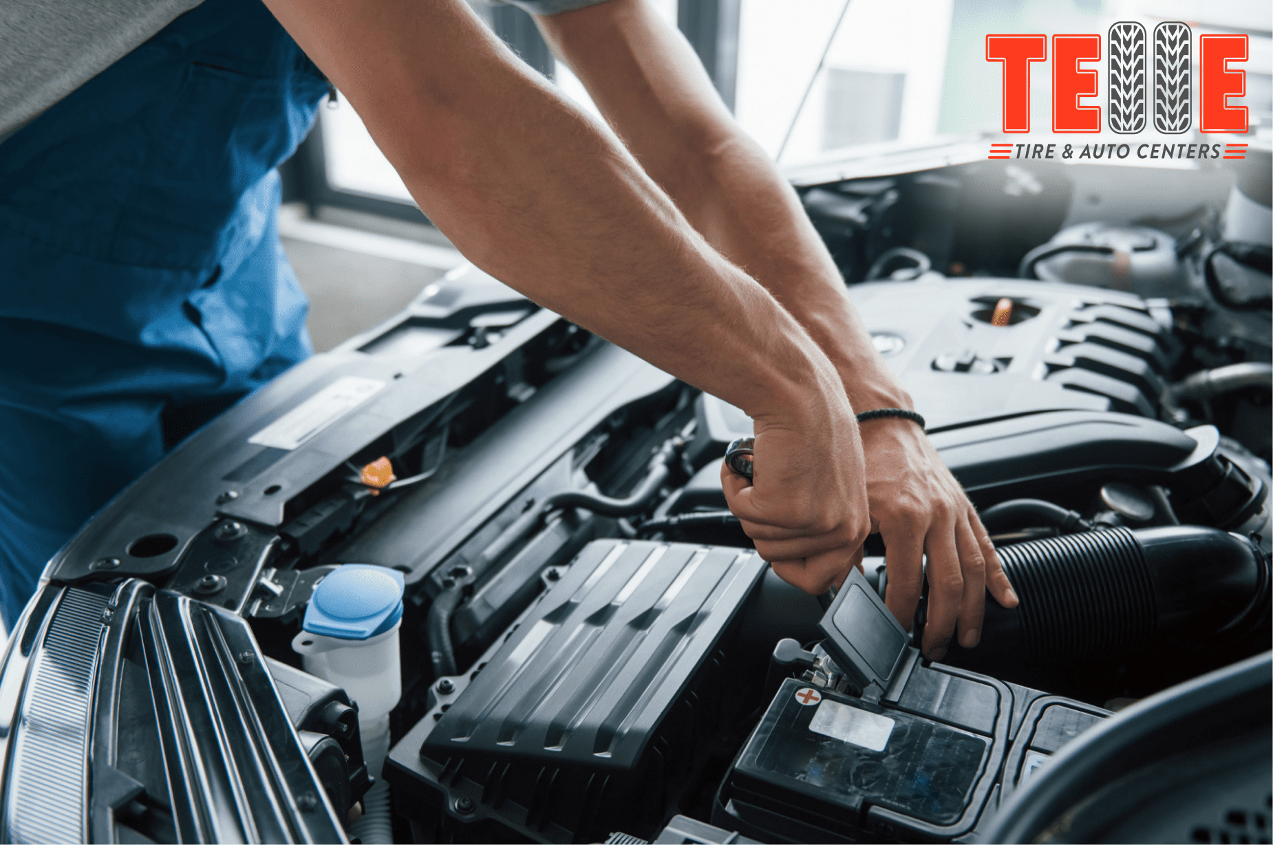 Technician performing car battery testing at Telle Tire & Auto Centers