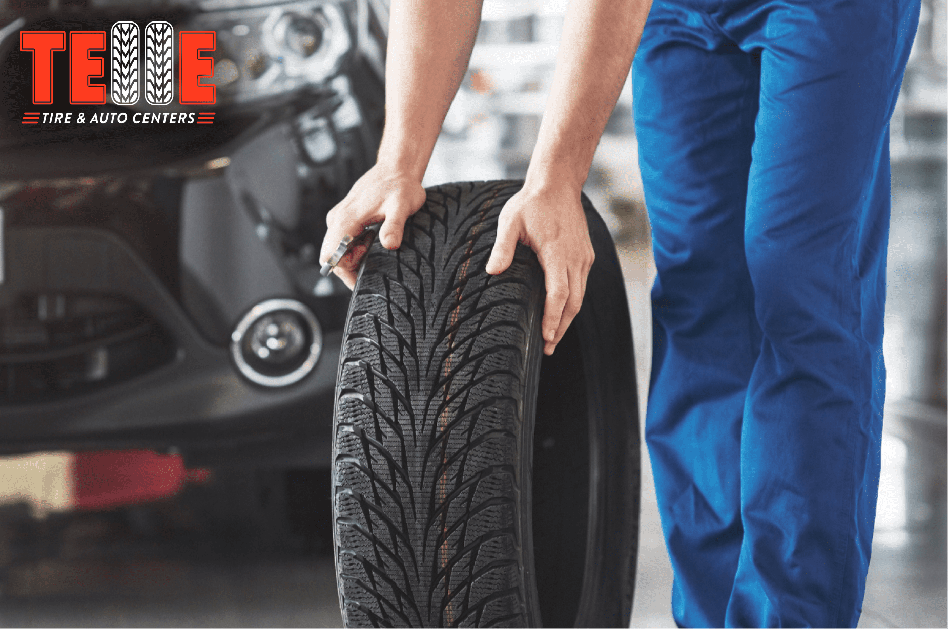 Technician inspecting tire tread affected by Missouri road conditions and tire wear