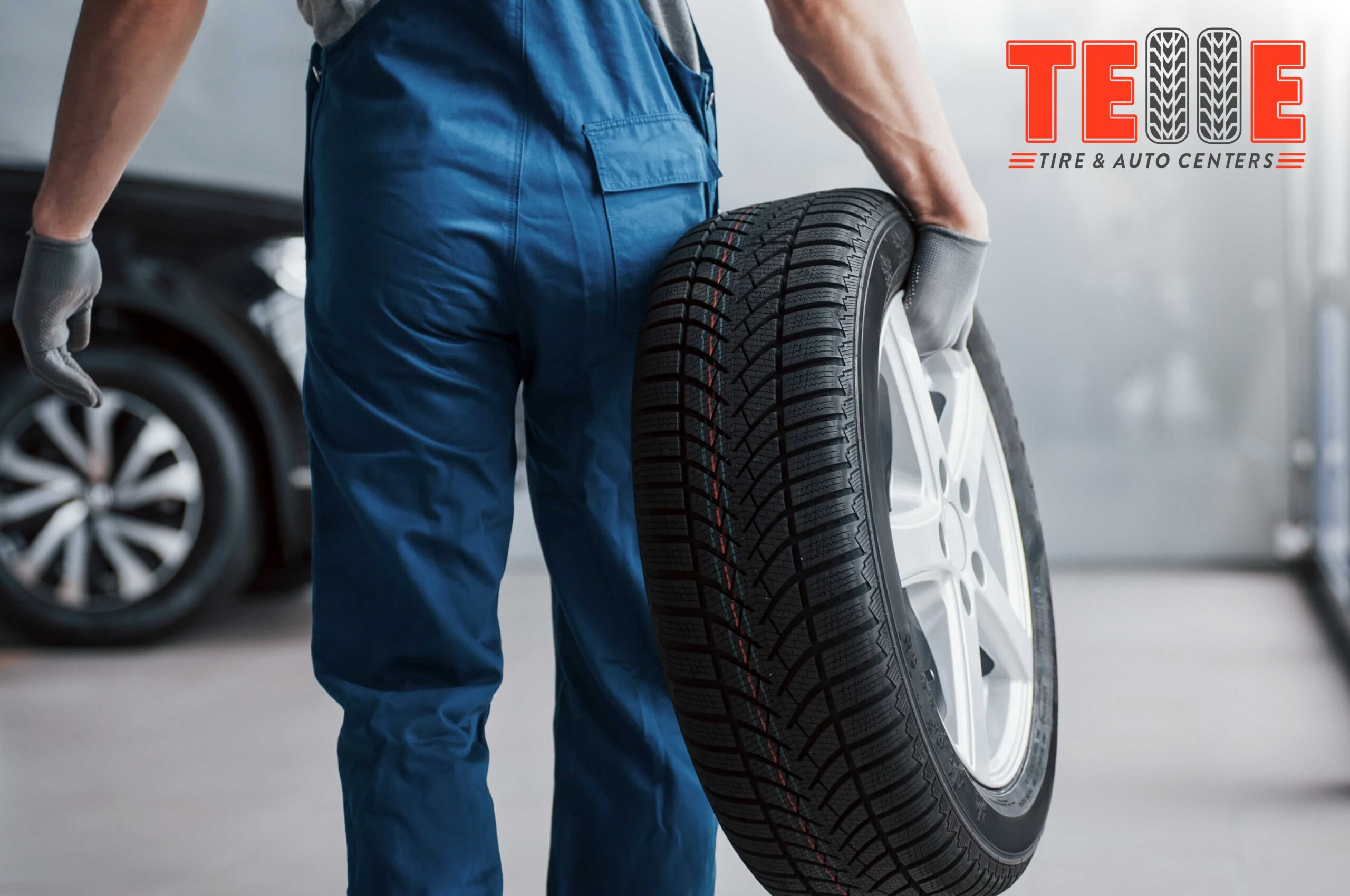 Technician installing new all-season tires at Telle Tire & Auto Centers in Missouri