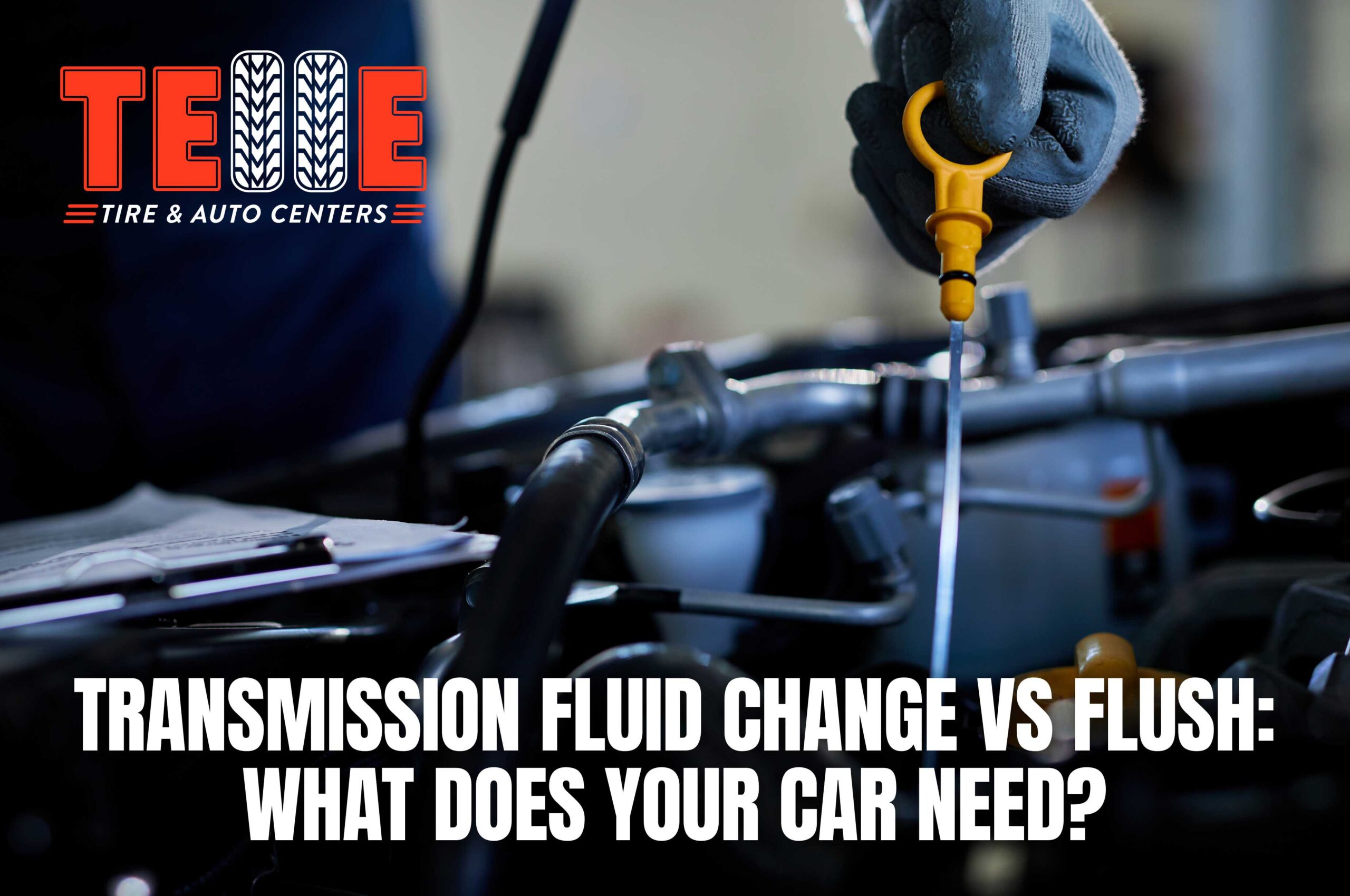 Mechanic checking transmission fluid during a vehicle maintenance inspection